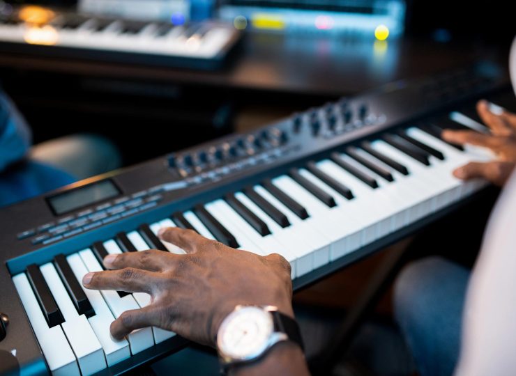 hands-of-young-african-composers-or-musician-touch-YJN5GHX.jpg